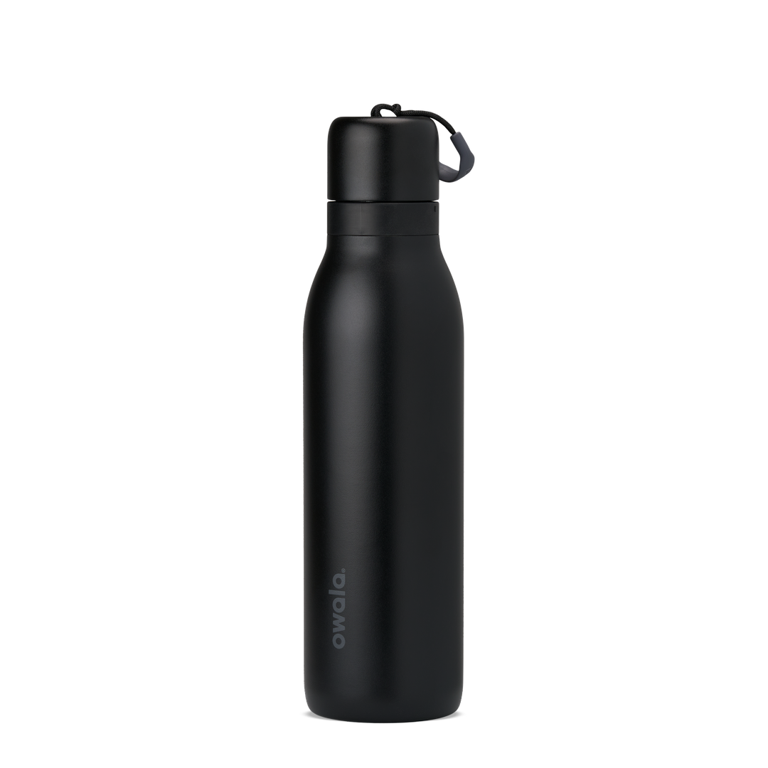 FreeSip Twist 24oz, coral pink body with orange-red lid and purple band; slim insulated bottle