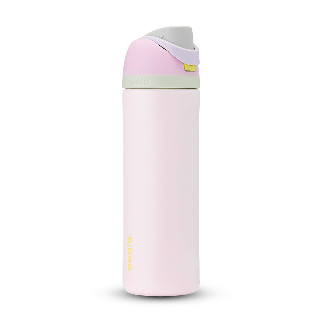 Owala FreeSip 24oz in Out of the Blue, periwinkle blue insulated bottle with matching blue-lavender flip cap and carry loop