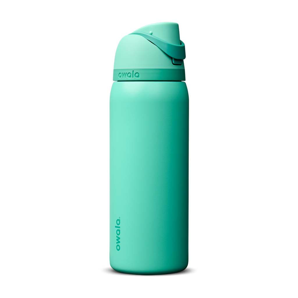 Owala FreeSip 24oz in Out of the Blue, periwinkle blue insulated bottle with matching blue-lavender flip cap and carry loop