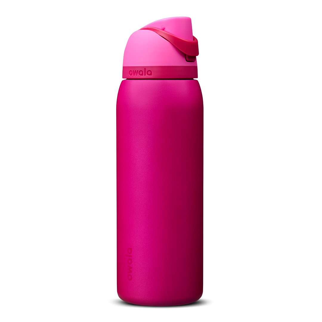 Owala FreeSip 24oz in Out of the Blue, periwinkle blue insulated bottle with matching blue-lavender flip cap and carry loop